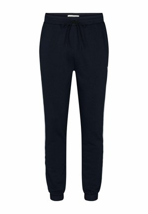 Tengerészeti színű melegítőnadrág, húzózsinórral a derékon, bokarészekkel és fehér oldalsávokkal, puha, texturált anyagból készült.