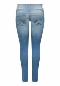 Jean skinny bleu clair avec poches arrière et détails délavés, présenté de dos sur fond blanc.