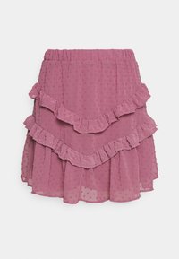 Jupe rose froissée à trois couches, en tissu léger, avec un motif de points texturés et une taille élastique.