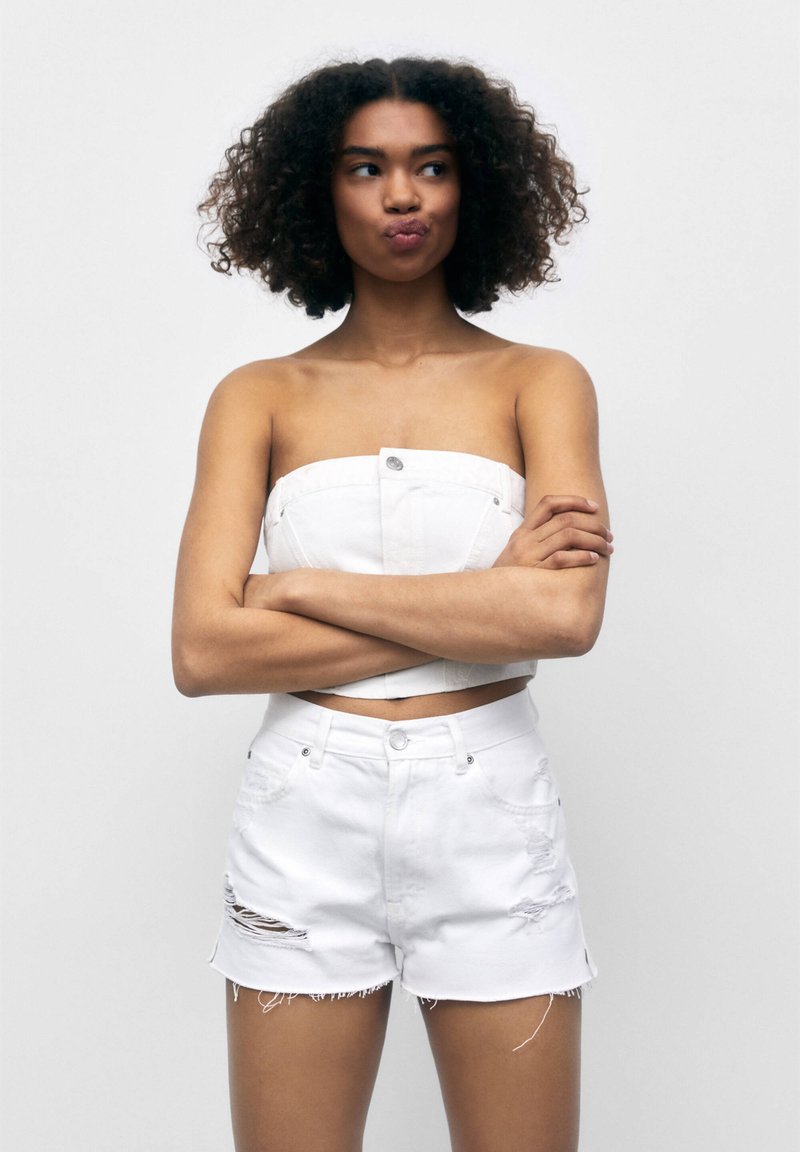 white denim jacket distressed