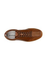 Brown leather sneaker with round toe, textured accents, and brown laces. Interior features branding and a tri-color stripe at the heel.