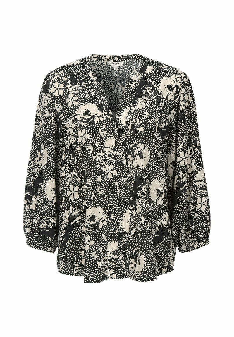 Svart och krämfärgad blus med blommönster, v-ringning, trekvarts puffärmar och en blandning av blommönster och prickar på lättviktsmaterial.