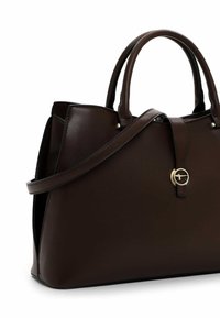 Borsa a mano in pelle marrone con due manici e una tracolla staccabile. Presenta accessori in oro e una leggera lucentezza, con un design strutturato.