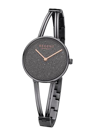 Montre ronde noire avec cadran scintillant, aiguilles des heures et des minutes en or rose, et bracelet fin en métal noir.