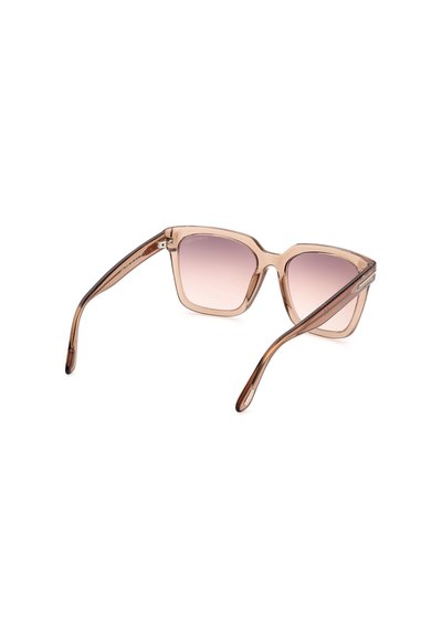 Occhiali da sole trasparenti color marrone chiaro con montatura quadrata, lenti sfumate e aste sottili caratterizzate da una leggera brillantezza e texture liscia.