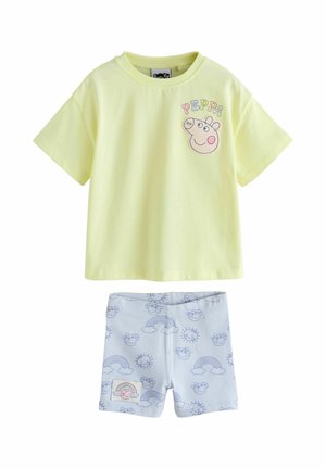 Yellow short-sleeve shirt with Peppa Pig face and name, paired with light blue shorts featuring rainbows, suns, clouds, and Peppa Pig faces.