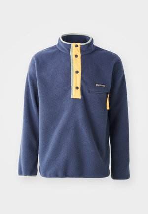 Marineblaue Fleece-Pullover mit gelbem Viertel-Reißverschluss an der Vorderseite und grauen Akzenten. Verfügt über eine Brusttasche mit Reißverschluss und einen Stehkragen.