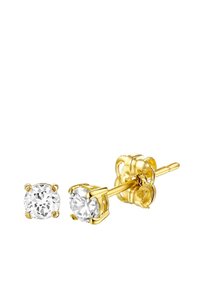 Boucles d'oreilles à clous en ton or, ornées de pierres en zircon cubique transparent rondes, maintenues par des griffes à quatre pattes. Fini en métal lisse avec un aspect poli.