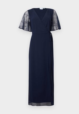 Robe portefeuille bleu marine avec col en V et manches papillon en dentelle semi-transparente, nouée à la taille, ourlet jusqu'au sol, tissu élégant et léger.