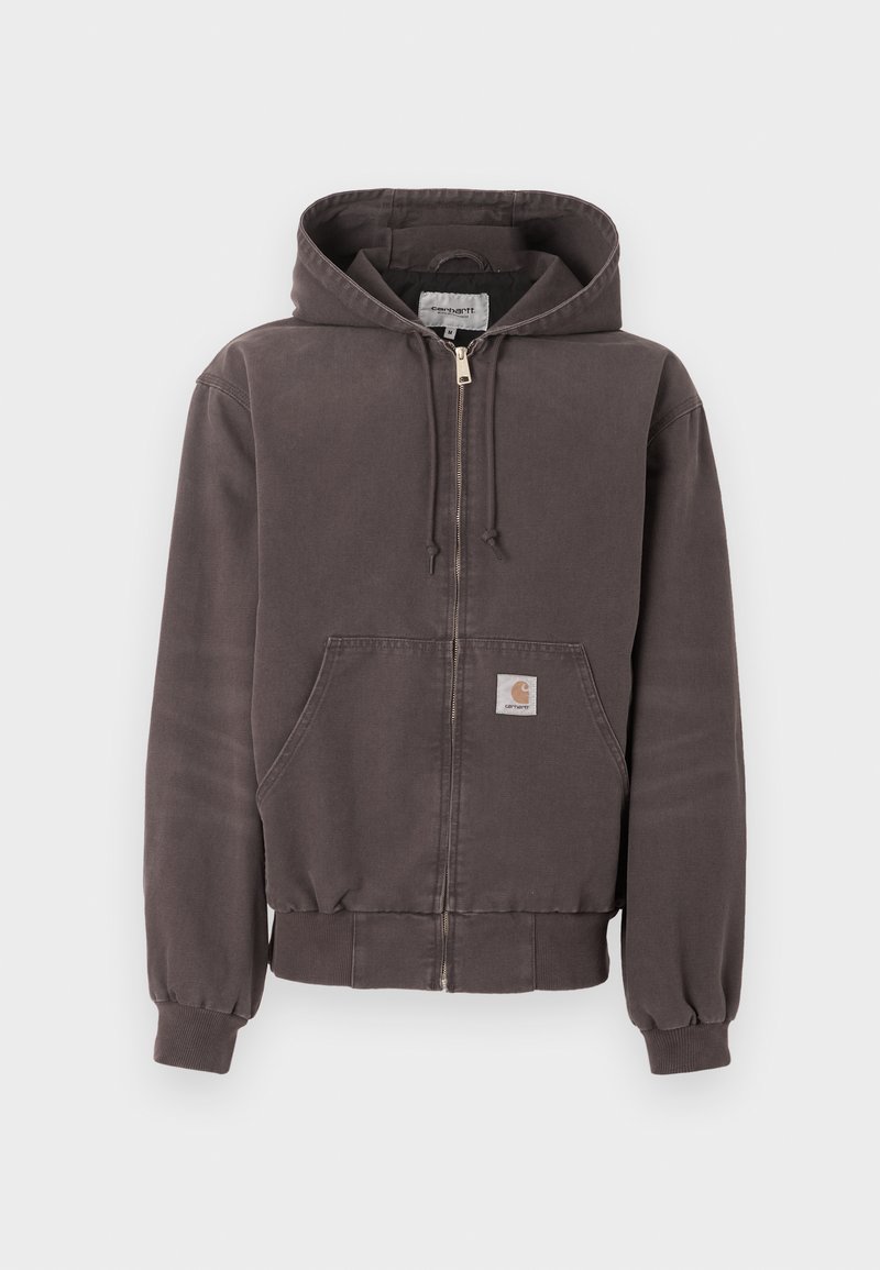 Felpa con cappuccio grigia scura con cerniera, tasche frontali, cappuccio con coulisse, polsini e orlo a costine, e una piccola toppa con logo sulla tasca.