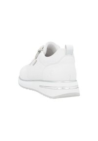 White athletic shoe with textured upper, zipper closure, and metallic accents. Features a thick, cushioned sole for comfort.