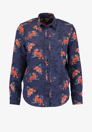 Marineblaue Hemdbluse mit schwarz-orangefarbenem Tiger-Muster und Bambus-Akzenten. Hergestellt aus glattem Stoff mit langen Ärmeln und einem klassischen Kragen.