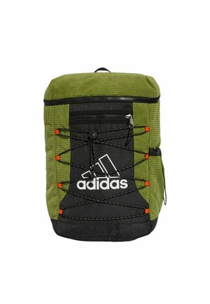 Green and black Adidas backpack with a textured surface, front bungee cord, zippered pocket, and prominent logo.