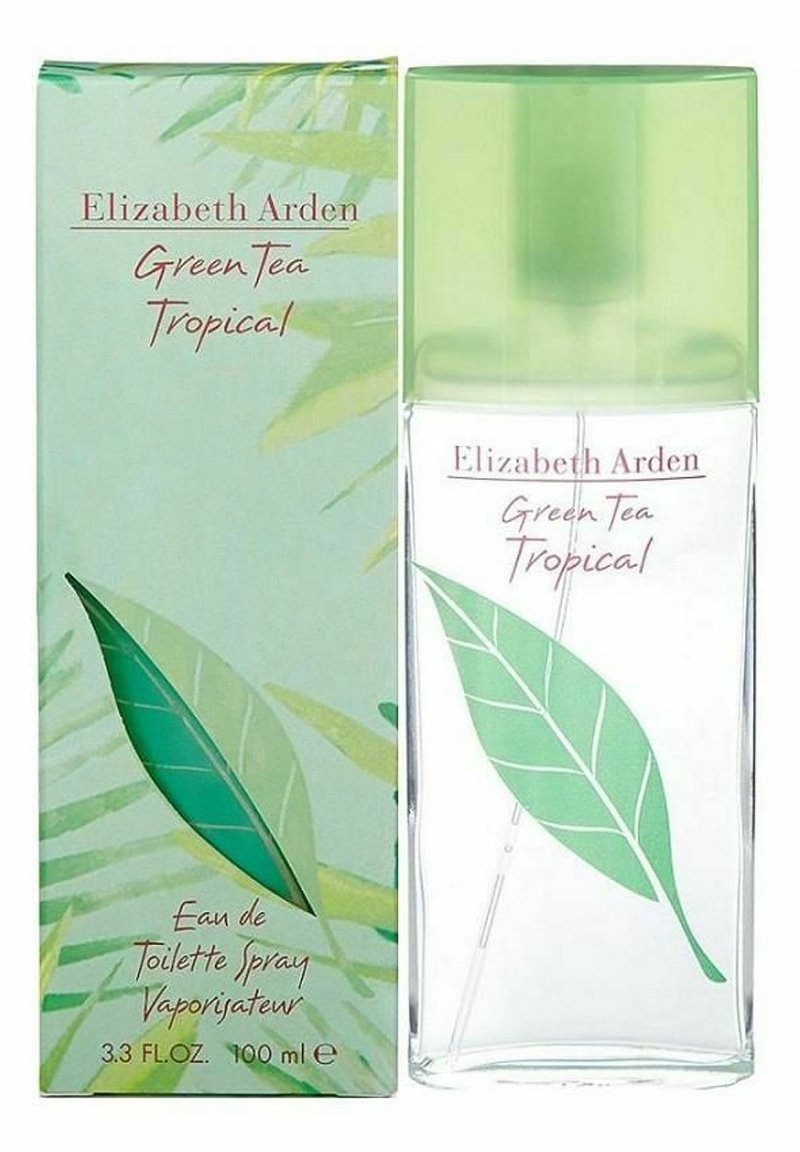 En klar glasflaska med ett grönt lövdesign, toppad med ett ljusgrönt lock. Lådan har en mjuk grön bakgrund med lövgrafik.