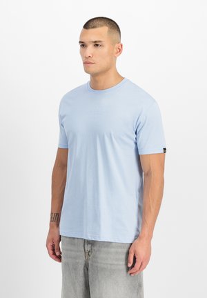 Light blue short-sleeve t-shirt made of soft fabric, featuring a crew neckline and subtle logo detailing on the front. Standard fit.