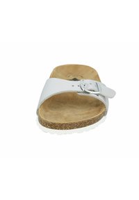 White slide sandal with a wide, smooth strap featuring a silver buckle. Cork midsole and textured beige footbed, rubber outsole.