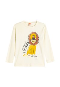 Cremefarbenes Langarm-T-Shirt mit einem Cartoon-Löwen-Design, braunem Mähnen und dem Text "SPASSIGER TAG MIT FREUNDEN" in Schwarz und Gelb.