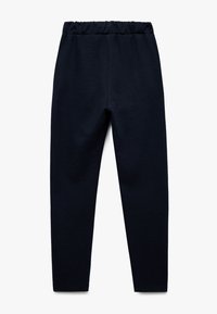 Mørkeblå joggingbukser med en tyk elastisk talje, tætsiddende design og glat tekstur. Ingen synlige mønstre eller hardware-detaljer.
