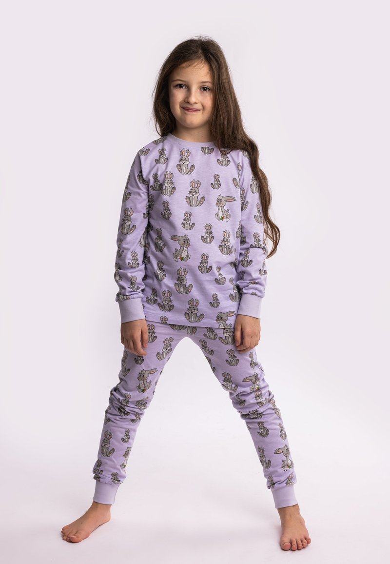 Lilac loungewear set featuring a long-sleeve top and pants, both adorned with a repeating rabbit and cactus pattern. Soft fabric, ribbed cuffs.