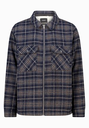 Marineblaue und braune karierte Reißverschlussjacke mit zwei Brusttaschen, einem Kragen und einer strukturierten Stoffoberfläche.