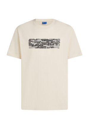 Beige T-shirt met korte mouwen met zwart-witte vervormde horizontale strepen en herhaalde "KARL LAGERFELD JEANS" tekst over de borst.