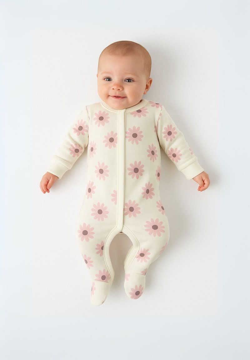 Bodie crema para bebé con patrones florales en tonos rosa claro y rosa oscuro. Mangas largas con cremallera frontal y diseño con pies para una cobertura completa.