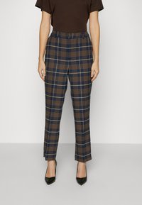 Ruudukkoiset housut tummansinisenä ja ruskeana, valmistettu teksturoidusta kankaasta. Korkea vyötärö ja suorat lahkeet, muotoiltu istuvuus.