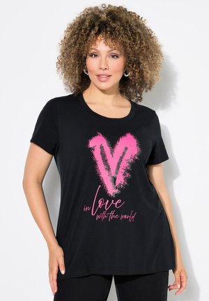 Black short-sleeve t-shirt featuring a pink heart and text design that reads "in love with the world." Made of soft cotton material.