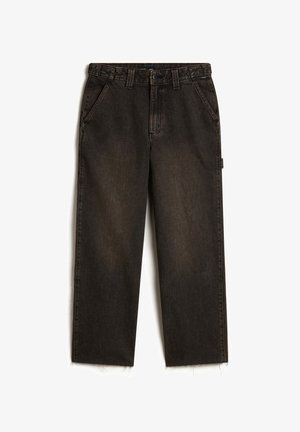 Black denim jeans feature a loose fit, five pockets, and frayed hems. The fabric displays a subtle texture with a slightly faded finish.