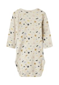 Lekki bawełniany body w kolorze kremowym z kwiatowym nadrukiem. Posiada długie rękawy, okrągły dekolt i zatrzaski na dole.