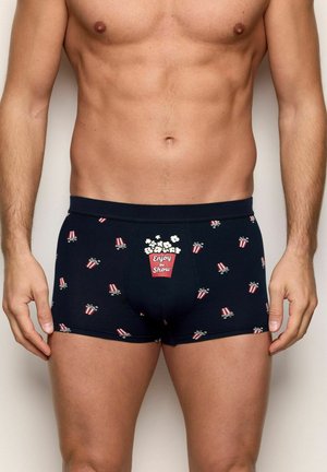 Granatowe bokserki o gładkiej fakturze, z nadrukiem w stylu popcornu i filmu. Pasek na talii z napisem "Enjoy the Show."