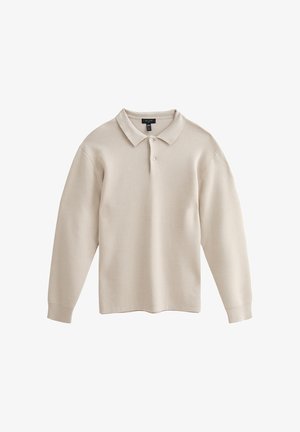 Lichtbeige poloshirt met lange mouwen, gemaakt van zachte stof; heeft een kraag en een sluiting met drie knopen. Glad textuur, casual ontwerp.