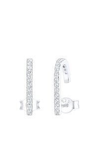 Sølvøreringe i hulform med en række klare krystaller langs forsiden. Bagsiden har en sikker lås og er stemplet med '925' for sølvindhold.