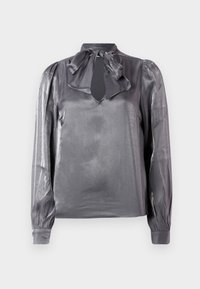 Blusa grigia in satin con collo a cravatta, apertura a chiave e maniche lunghe con polsini elasticizzati. Texture liscia e leggero lucido.