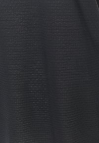 Under Armour STREAKER TANK - Débardeur - black