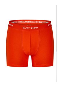 Rote Baumwoll-Boxershorts mit einem weichen Bund, auf dem der Text "HAPPY SHORTS" in Weiß steht. Das Design ist figurbetont mit minimalen Nähten.