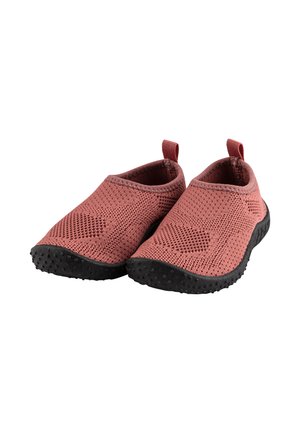 Pair of red mesh slip-on shoes with textured black rubber soles and pull tabs on the back, designed for casual wear.
