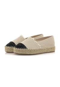Espadrillas beige con punta glitter nera, tomaia in tessuto sfrangiato e suola in corda di juta. Tessuto testurizzato con un design casual.