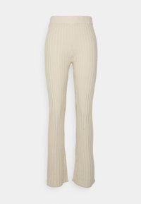 Calças creme com textura canelada e design largo, apresentando uma cintura elástica e uma textura suave. O tecido tem riscas verticais em toda a superfície.