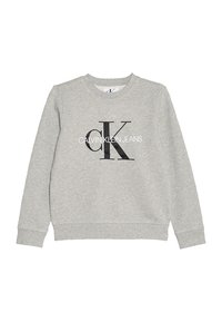 Felpa grigia in cotone con scollo tondo. Presenta un grande logo nero "CK" e la scritta "CALVIN KLEIN JEANS" sul petto.