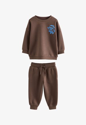 Braunes Kinder-Sweatshirt- und Hosenset mit blauer Comic-Schokoladenmilchkarton-Grafik auf der Brust.