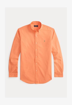 Garās piedurknes pogājamā krekla spilgti oranžā kokvilnā ar noapaļotu apkakli, pogājamām aprocēm un mazu izšūtu logo uz krūtīm.