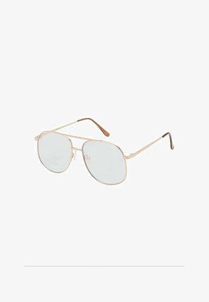 Naočale aviator s tankim okvirom od zlatnog metala, svijetloplave leće i hrapavim çıkama smeđe boje. Imaju klasičan ovalni oblik.