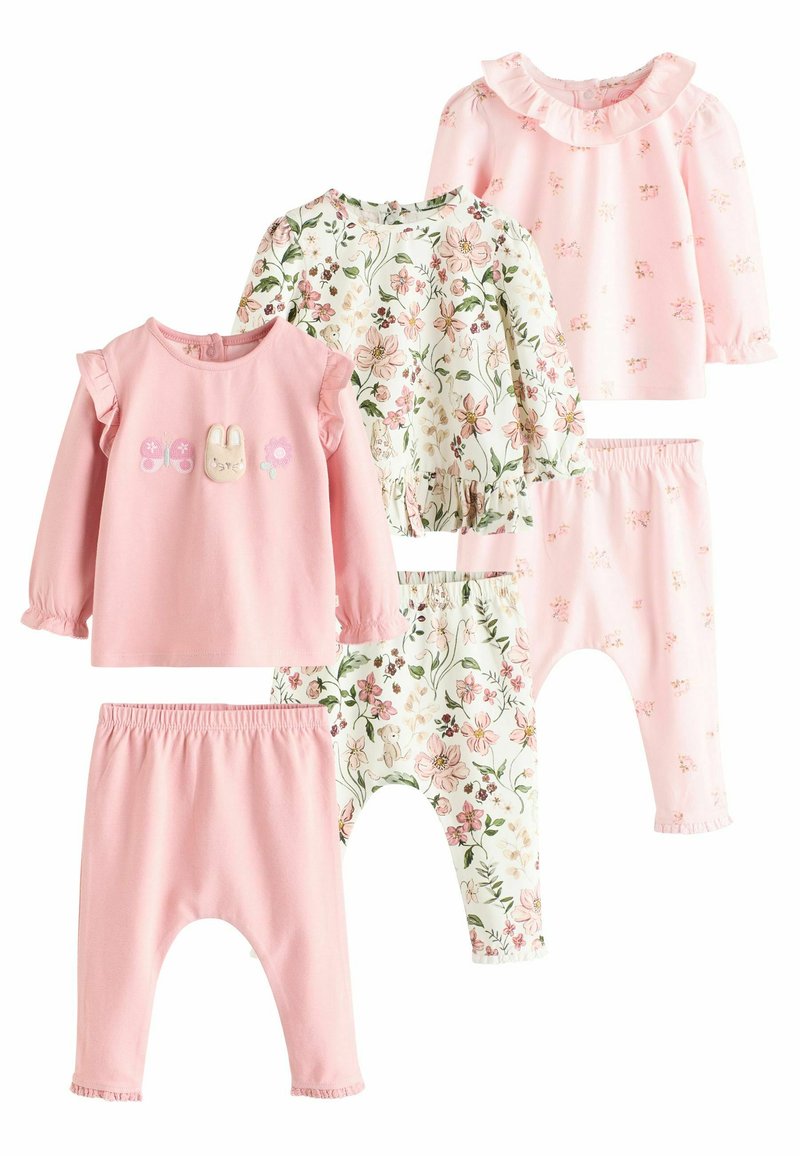 Fünfteiliges Kinderbekleidungsset mit rosa Oberteilen mit Blumenmustern, Leggings mit Blumenprint und Rüschendetails. Aus Baumwollstoff.
