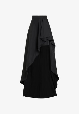 Black high-waist maxi skirt with smooth fabric and layered asymmetrical draped overlay on a plain white background.