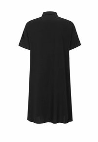 Schwarzes Polohemd mit lockerer Passform, kurzen Ärmeln und klassischem Kragen. Hergestellt aus weichem Stoff mit glatter Textur, ohne sichtbare Muster.