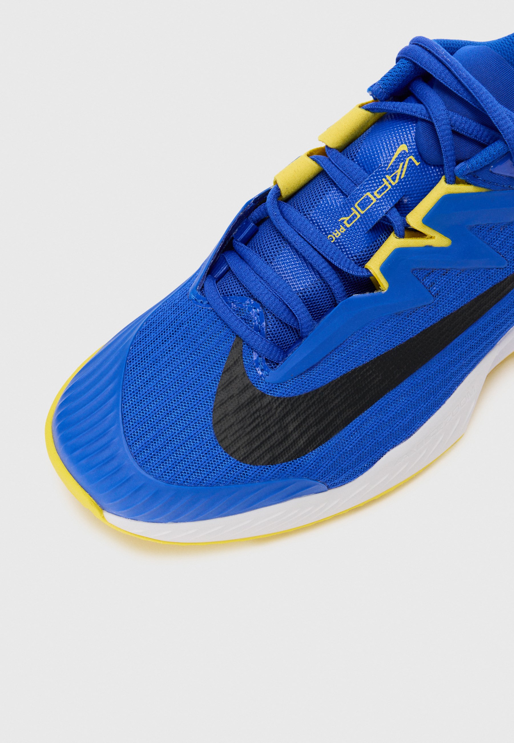 nike blue and yellow shoes