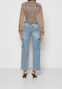 Guess Originals Džínová bunda - light pink