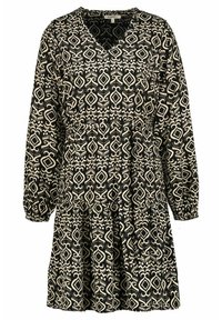 Svart och gräddfärgad mönstrad klänning med långa ärmar, V-halsringning, samlad midja och flera lager i kjolen, med intrikata geometriska mönster.