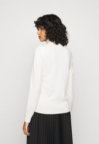 Repeat - Sweter